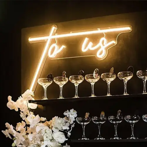 Neon letters To Us