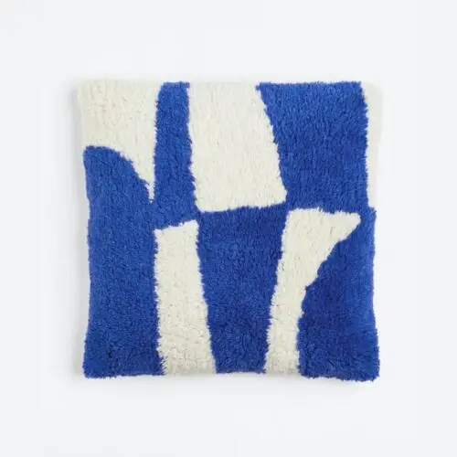 Wollen kussen helderblauw/wit detail