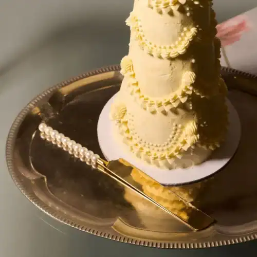 Taartmes goud met parels